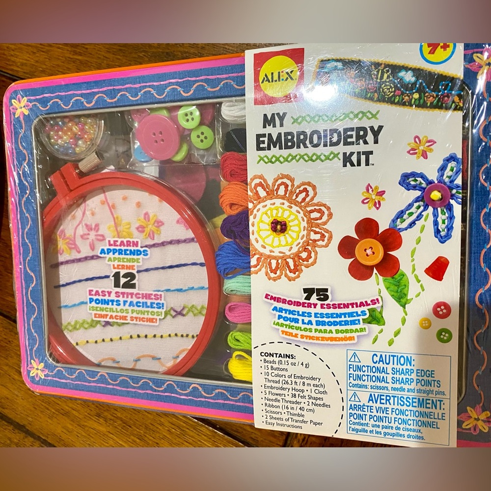 An Embroidery Kit for 7+ Years Old. 75 Pieces to make different flowers. IN TIN.